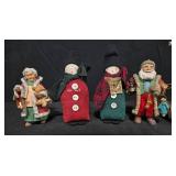 Collection of Christmas Figurines and Cross-Stitch Ornaments