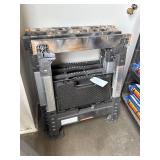 Four Collapsible Plastic Sawhorses with Integrated Storage