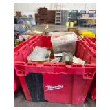 Red Milwaukee Storage Bin with Assorted Anchors and Screws