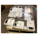 27 Boxes of TrafficMaster Dark Grey Slate 3 mil x 12 in. W x 12 in. L Peel and Stick Water Resistant Vinyl Tile Flooring 30 Sq. Ft.  Customer Returns See Pictures