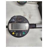 Comprehensive lot featuring a Zeiss Surfcom 130A surface roughness measuring instrument and a selection of digital and analog gauges, probes, and precision measuring accessories.
