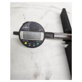 Comprehensive lot featuring a Zeiss Surfcom 130A surface roughness measuring instrument and a selection of digital and analog gauges, probes, and precision measuring accessories.