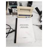 Comprehensive lot featuring a Zeiss Surfcom 130A surface roughness measuring instrument and a selection of digital and analog gauges, probes, and precision measuring accessories.