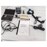Comprehensive lot featuring a Zeiss Surfcom 130A surface roughness measuring instrument and a selection of digital and analog gauges, probes, and precision measuring accessories.