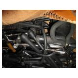 Box lot of misc guitar stands...
