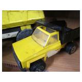 Vintage metal Tonka dump truck plus...