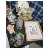 Larger rabbit themed statues with a...