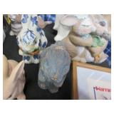 Larger rabbit themed statues with a...