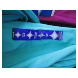 5 Sets of scrubs in various colors ...