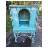 Turquoise and Gold Gothic Curio Cabinet Turquoise and Gold Gothic Curio Cabinet
