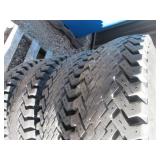 4 Wolf Paws Skid loader tires on 8 ...