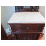Ornate makeup stand with a marble t...