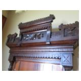 Ornately framed wall mirror with ma...