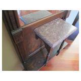 Ornately framed wall mirror with ma...