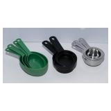 Assorted Measuring Cups – Plastic, Metal, and Ceramic