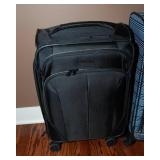 Set of Two Luggage Pieces – American Tourister Carry-On and Blue Checked Bag