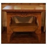 Antique Parlor Table with Carvings and Wooden Motif