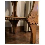 Antique Parlor Table with Carvings and Wooden Motif