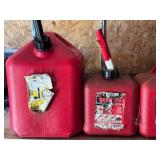 S - Group of Empty Gas Cans and Assorted Automotive Oil Containers