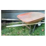 S - Used Metal Wheelbarrow with Wooden Handles