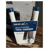 G - Pistol-Grip Grease Gun, Sawzall Blade, and Tool Hangers Lot