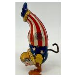 Vintage J. Chein Clown Wind-Up Tin Toy, Plastic Hen with Eggs, and Red Metal Wagon Vintage J. Chein Clown Wind-Up Tin Toy, Plastic Hen with Eggs, and Red Metal Wagon