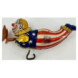 Vintage J. Chein Clown Wind-Up Tin Toy, Plastic Hen with Eggs, and Red Metal Wagon Vintage J. Chein Clown Wind-Up Tin Toy, Plastic Hen with Eggs, and Red Metal Wagon