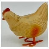 Vintage J. Chein Clown Wind-Up Tin Toy, Plastic Hen with Eggs, and Red Metal Wagon Vintage J. Chein Clown Wind-Up Tin Toy, Plastic Hen with Eggs, and Red Metal Wagon