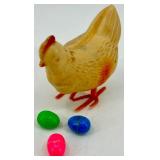 Vintage J. Chein Clown Wind-Up Tin Toy, Plastic Hen with Eggs, and Red Metal Wagon Vintage J. Chein Clown Wind-Up Tin Toy, Plastic Hen with Eggs, and Red Metal Wagon