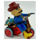 Vintage Wind-Up Tin Toys Lot - Tank and Cowboy on Tricycle Vintage Wind-Up Tin Toys Lot - Tank and Cowboy on Tricycle