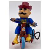 Vintage Wind-Up Tin Toys Lot - Tank and Cowboy on Tricycle Vintage Wind-Up Tin Toys Lot - Tank and Cowboy on Tricycle