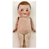 Pair of Antique Bisque Jointed Dolls including Kewpie Pair of Antique Bisque Jointed Dolls including Kewpie