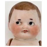 Pair of Antique Bisque Jointed Dolls including Kewpie Pair of Antique Bisque Jointed Dolls including Kewpie