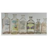 Collection of 12 Antique Glass Water Slide Bottles with Original Labels Collection of 12 Antique Glass Water Slide Bottles with Original Labels