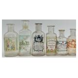 Collection of 12 Antique Glass Water Slide Bottles with Original Labels Collection of 12 Antique Glass Water Slide Bottles with Original Labels