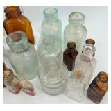 Collection of 25 Vintage Glass Bottles in Assorted Styles and Colors Collection of 25 Vintage Glass Bottles in Assorted Styles and Colors