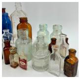 Collection of 25 Vintage Glass Bottles in Assorted Styles and Colors Collection of 25 Vintage Glass Bottles in Assorted Styles and Colors