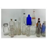 Collection of 18 Vintage and Antique Glass Bottles Assorted Colors and Shapes Collection of 18 Vintage and Antique Glass Bottles Assorted Colors and Shapes