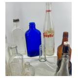 Collection of 18 Vintage and Antique Glass Bottles Assorted Colors and Shapes Collection of 18 Vintage and Antique Glass Bottles Assorted Colors and Shapes