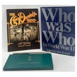 Book Lot: Who Was Who in World War II, Charlie Daniels Band Songbook, and Prince Gardner Wallet Book Lot: Who Was Who in World War II, Charlie Daniels Band Songbook, and Prince Gardner Wallet