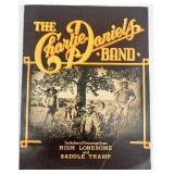 Book Lot: Who Was Who in World War II, Charlie Daniels Band Songbook, and Prince Gardner Wallet Book Lot: Who Was Who in World War II, Charlie Daniels Band Songbook, and Prince Gardner Wallet