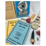 Vintage Fishing Tackle, WWII Manuals, and Joke Books Collection Vintage Fishing Tackle, WWII Manuals, and Joke Books Collection