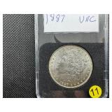 1887 Morgan Silver Dollar Marked UNC When Purchased 1887 Morgan Silver Dollar Marked UNC When Purchased
