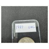 1887 Morgan Silver Dollar Marked UNC When Purchased 1887 Morgan Silver Dollar Marked UNC When Purchased