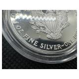 Proof First Year of Issue 1986-S American Silver Eagle in Plastic Case PCGS Price Guide for a PF-69 is $129, PF-70 is $375 Proof First Year of Issue 1986-S American Silver Eagle in Plastic Case PCGS Price Guide for a PF-69 is $129, PF-70 is $375