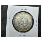 1885 Morgan Silver Dollar Marked AU When Purchased 1885 Morgan Silver Dollar Marked AU When Purchased