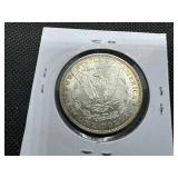 1885 Morgan Silver Dollar Marked AU When Purchased 1885 Morgan Silver Dollar Marked AU When Purchased