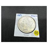 1887 Morgan Silver Dollar Marked 64+ When Purchased - Nice Mint Luster!! 1887 Morgan Silver Dollar Marked 64+ When Purchased - Nice Mint Luster!!