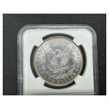1887 Morgan Silver Dollar NGC MS62 - Rainbow Orange and Blue Toned!! 1887 Morgan Silver Dollar NGC MS62 - Rainbow Orange and Blue Toned!!