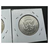 Two 90% Silver Kennedy Half Dollars - 1964 and 1964-D Both Marked AU 55 When Purchased Two 90% Silver Kennedy Half Dollars - 1964 and 1964-D Both Marked AU 55 When Purchased